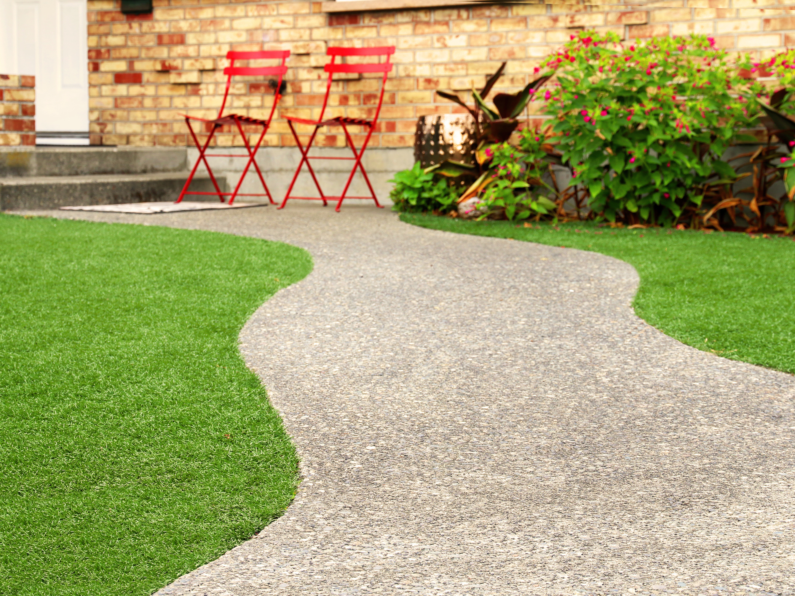 Synthetic grass with stone pathway